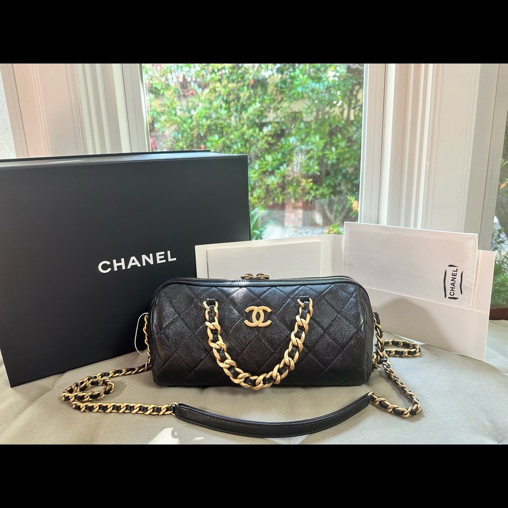 CHANEL Agneau Quilted Leather Gold Chain Bowling Bag, in medium size.
